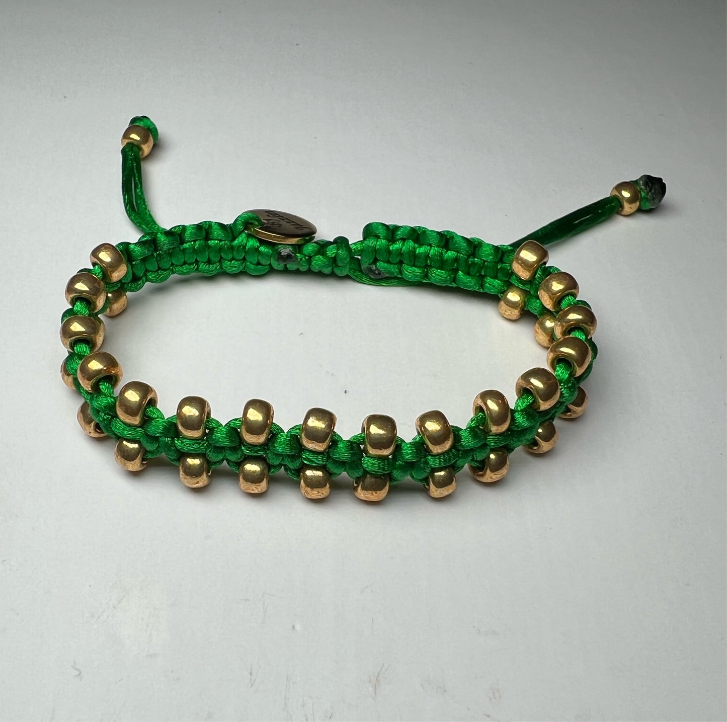 Braided bracelet Groen