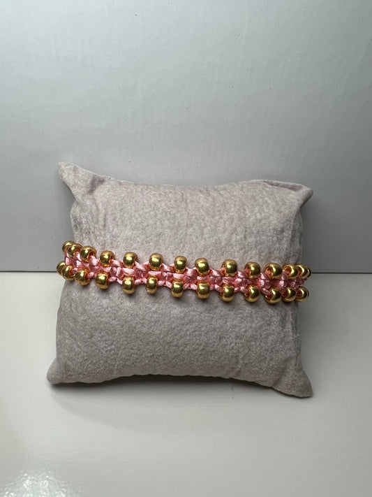 Braided bracelet Roze